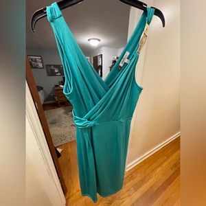 Jlo dress size medium. Gold buckle shoulder detail